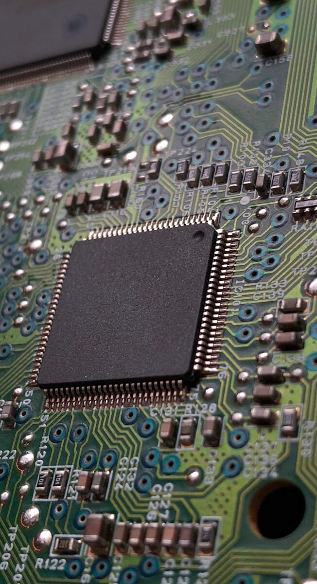 close-up photography of green motherboard